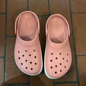 Pink platform crocs